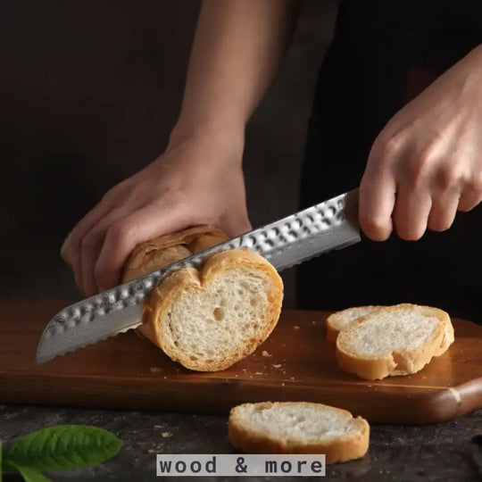 Damascus bread knife with rosewood handle for versatile kitchen applications