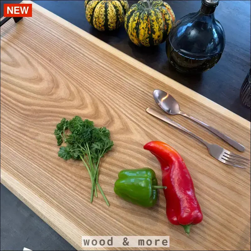 Handcrafted elm wood cutting board with beautiful wood grain.