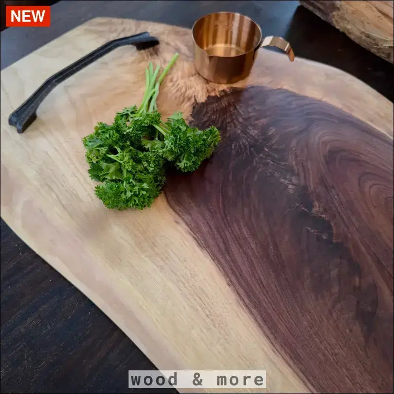 Handcrafted elm wood cutting board with natural edge and beautiful wood contrasts.