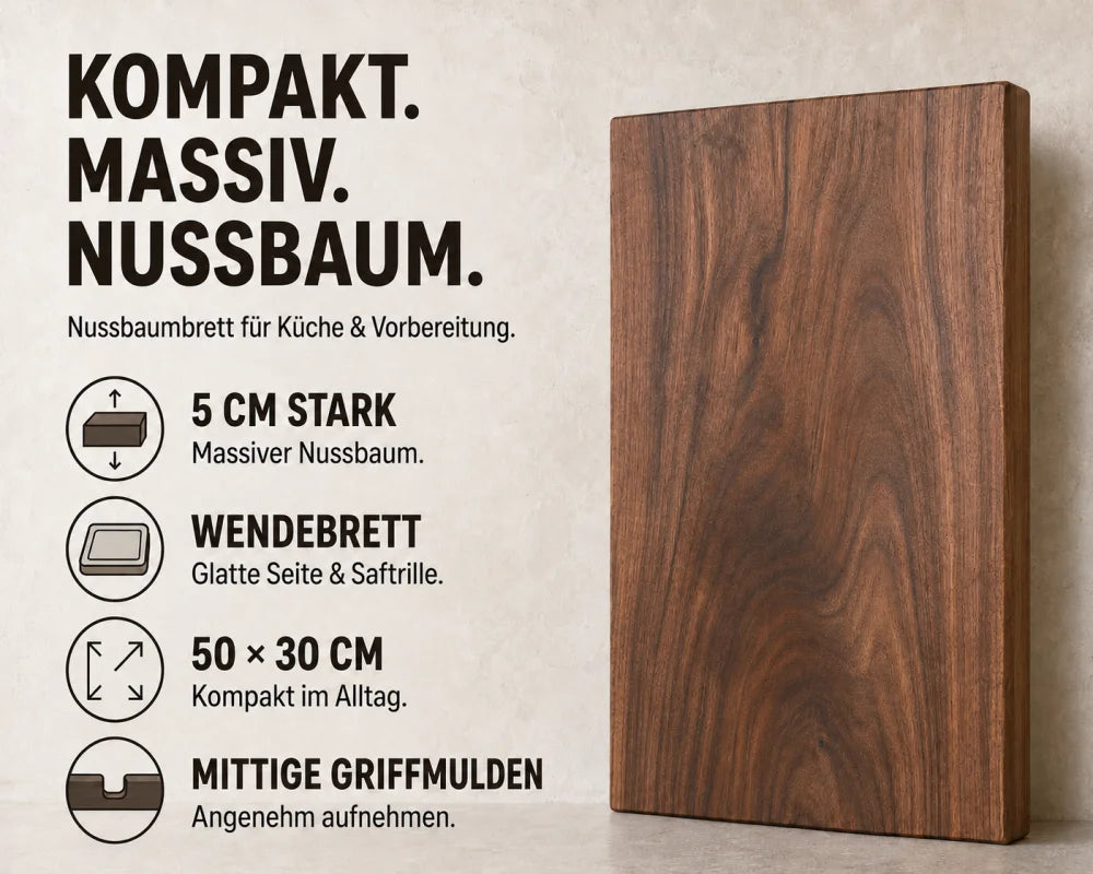 Nussbaum-Schneidebrett 50 × 30 × 5 cm im Magazin-Stil, als Wendebrett mit glatter Seite, Saftrillenseite und mittigen Griffmulden beschrieben.